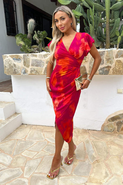 Vestido midi cruzado estampado rosas y naranjas