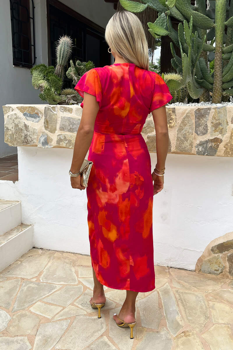 Vestido midi cruzado estampado rosas y naranjas