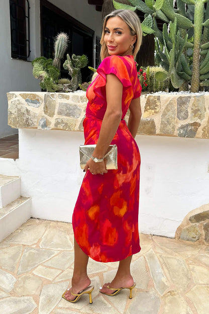Vestido midi cruzado estampado rosas y naranjas