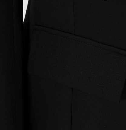 Blazer sin espalda de color liso