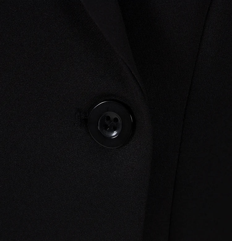 Blazer sin espalda de color liso